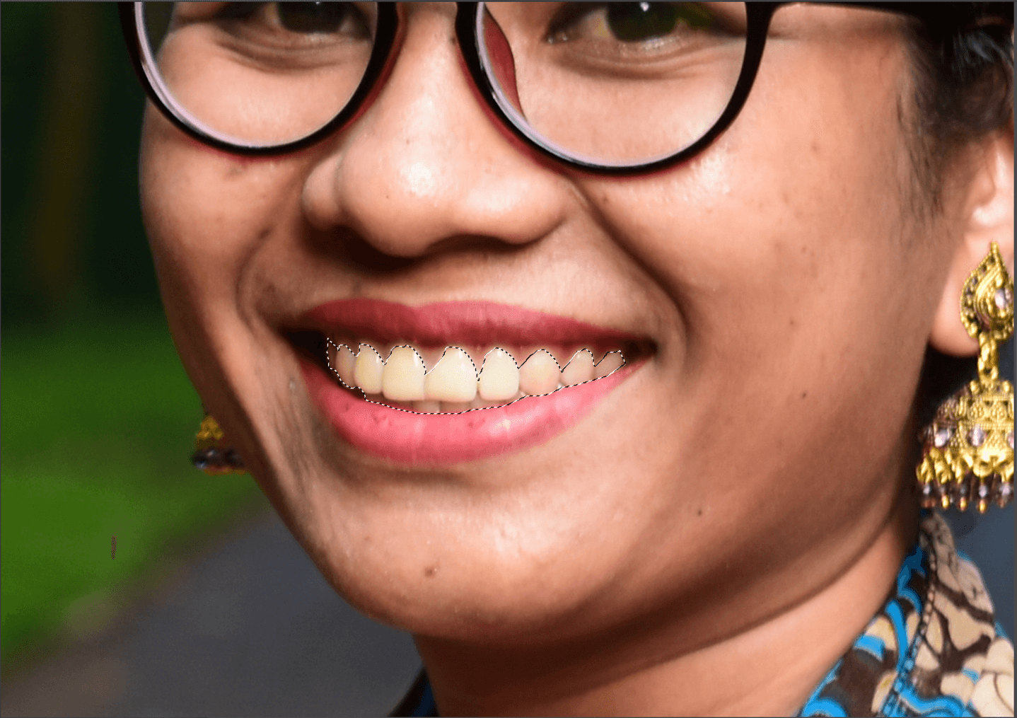 asian girl with teeth selected in Photoshop