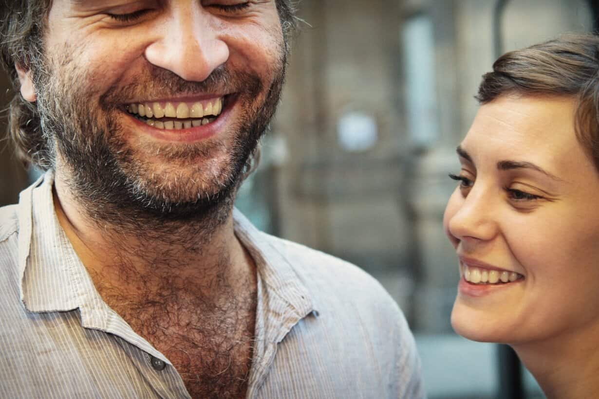 two people smiling