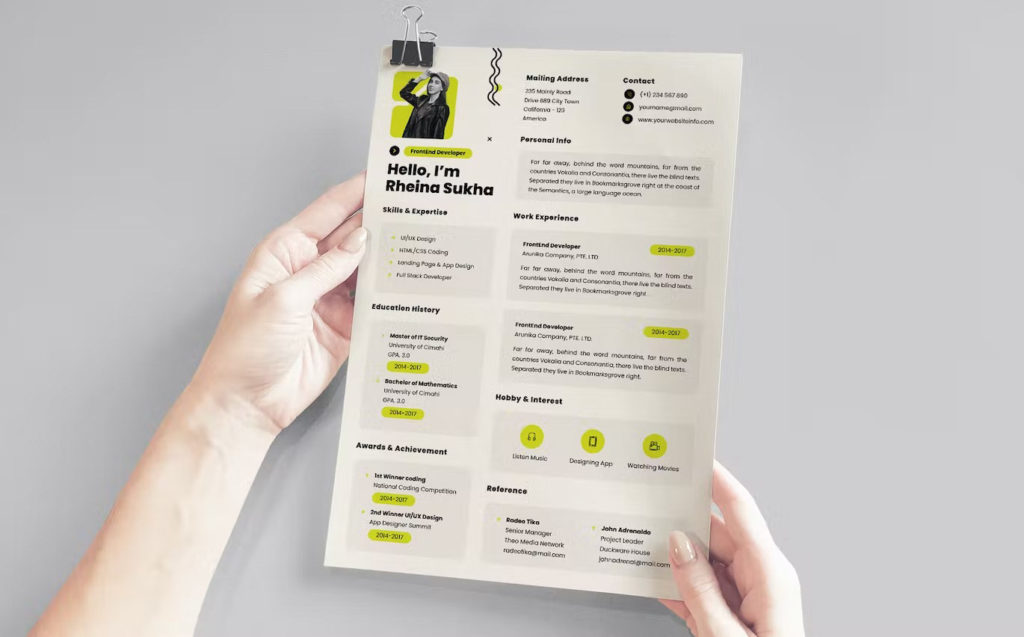 designer resume in hand 